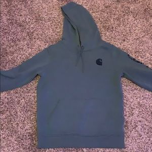 Green Carhartt hoodie.